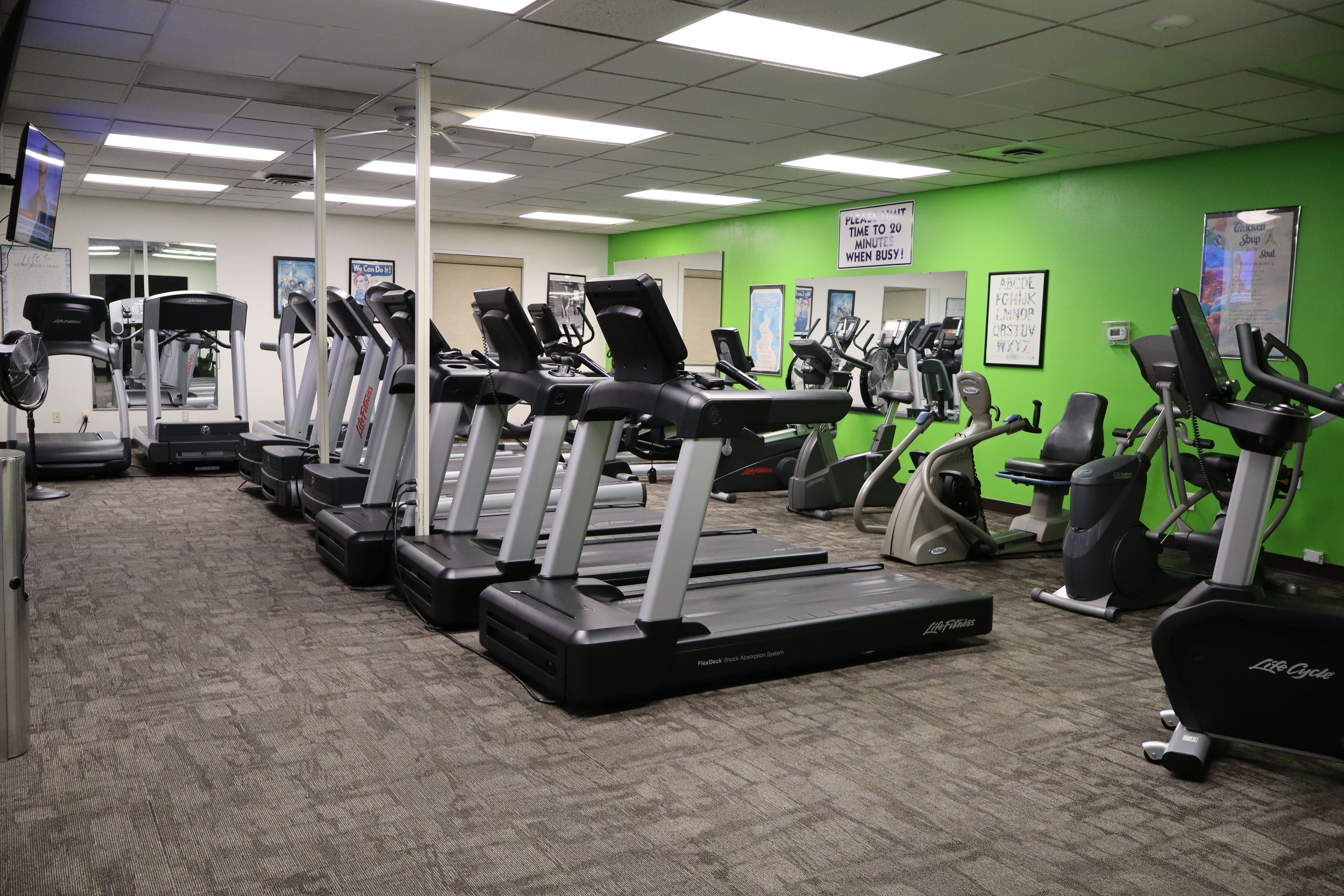 Cardio room with treadmills and ellipticals at Locomotion Fitness Center